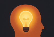 Die Wissenschaft der Manifestation: Wie du mit deinem Gehirn und dem Universum Realität erschaffst Illustration eines stilisierten menschlichen Profils mit leuchtender Glühbirne im Kopfbereich vor dunklem Hintergrund – symbolisiert Inspiration, geistige Klarheit und kreative Schöpferkraft im Kontext von Manifestation und Bewusstseinsarbeit.